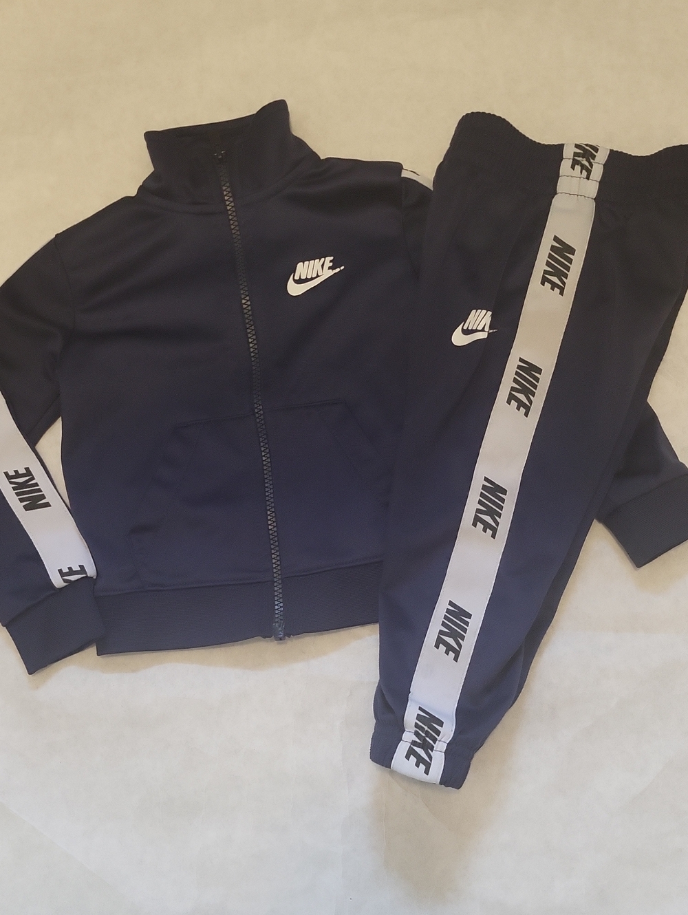 Nike navy two piece athletic track suit